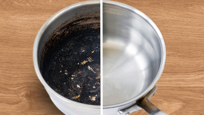 stainless steel pot showing one half as dirty and the other half as clean