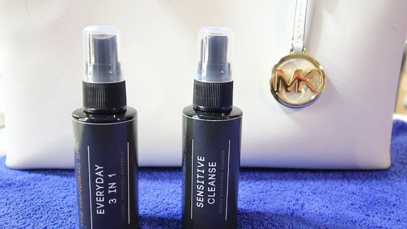 The Handbag Spa Kit next to a michael kors handbag